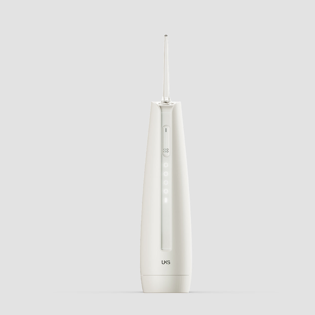 white dental water flosser on a light gray background
