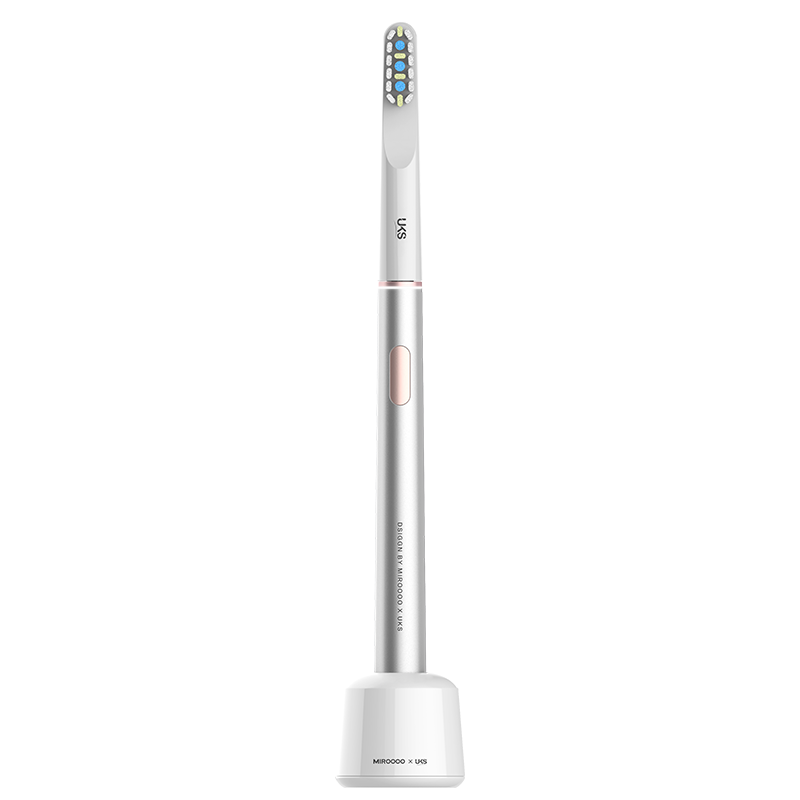 Electric toothbrush with a white handle and bristle head on a white background