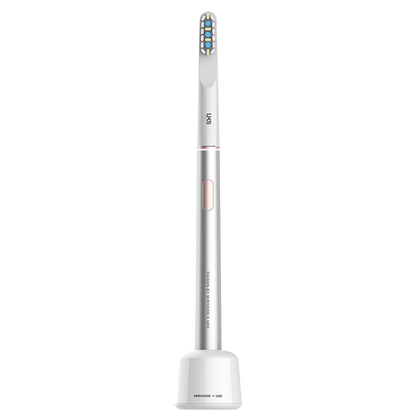 Electric toothbrush with a white handle and bristle head on a white background